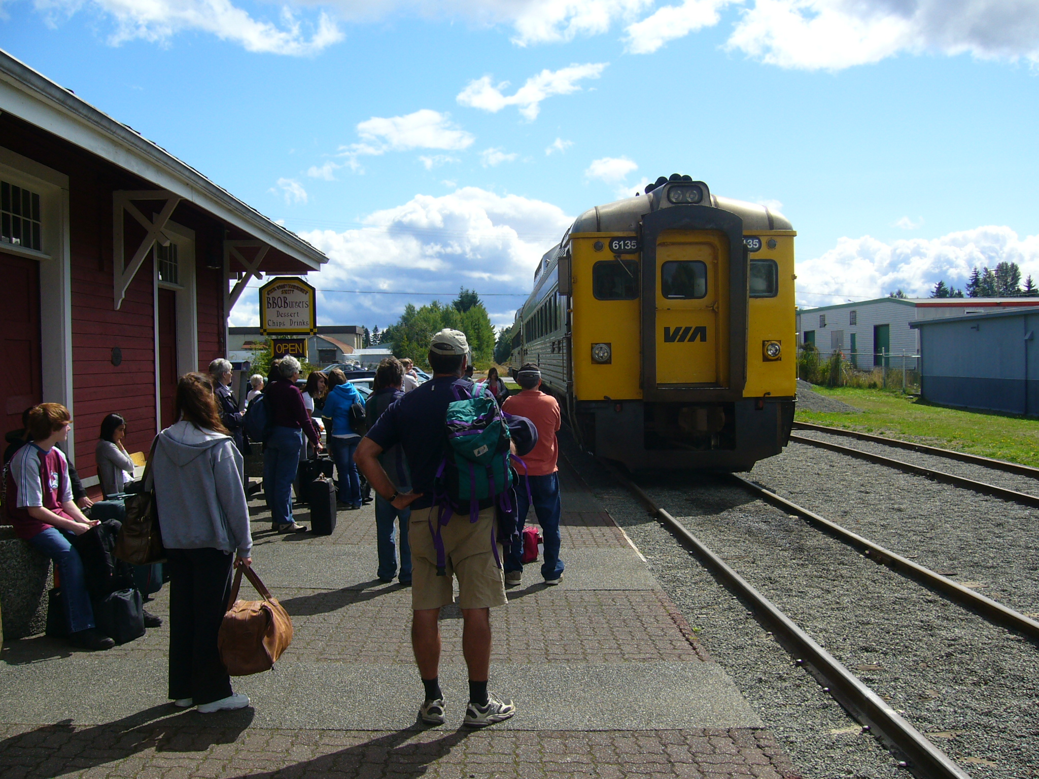 people are eager to get on, but passengers still have to get off. VIA Rail train arrives in Courtney, BC