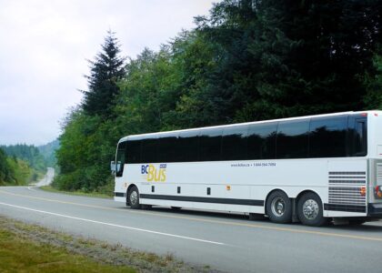 Motorcoach in BC Bus North livery travelling down Highway 16 in northern British Columbia. Photo credit: Government of British Columbia CC BY-NC-ND 2.0