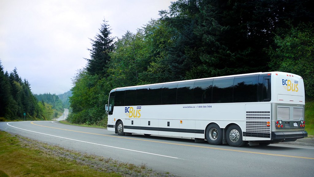 Motorcoach in BC Bus North livery travelling down Highway 16 in northern British Columbia. Photo credit: Government of British Columbia CC BY-NC-ND 2.0